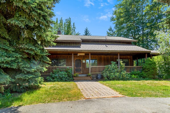 A beautiful house nestled in the country, with plenty of space to wander about.