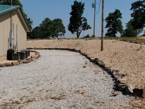 Gravel drive around building for easy turnaround