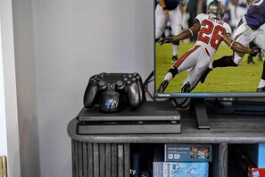 Pocono mountains rental | Kick back and enjoy gaming on the PS4 in our cozy game room, perfect for some downtime fun | Serhii Vacation Rentals