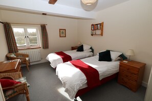 Bedroom 1: 2 singles or a double bed