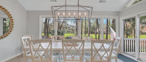 Dining room with seating for 10 and patio access just off the kitchen.