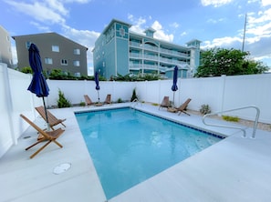 Private heated pool + lounge area