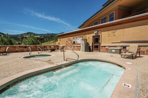 Rooftop hot tub, one of two hot tubs on property