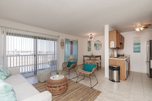Versatile living area featuring a harmonious blend of comfort and style, ideal for both relaxation and entertaining