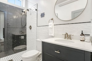 Large, beautifully designed bathroom with all the natural light you could want for getting ready in the morning!