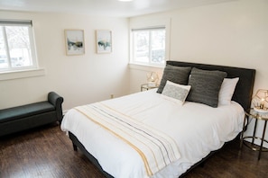 Retreat to our Master Bedroom: Your Haven for Relaxation! Unwind on the Comfiest Bed and Pillows after a Long Day.