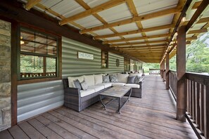 Large covered front porch offers 3 areas to sit and relax.