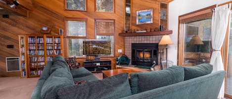 Living room with wood burning fireplace