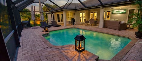 Screened paver lanai, waterfall pool & 2 tiered deck make a special outdoor life