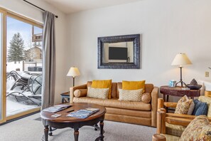 Living Room with Teton Views and wood burning fireplace