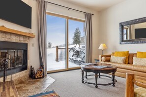 Living Room with Teton Views and wood burning fireplace