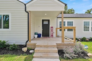 Big welcoming front yard to sit and relax or play some games