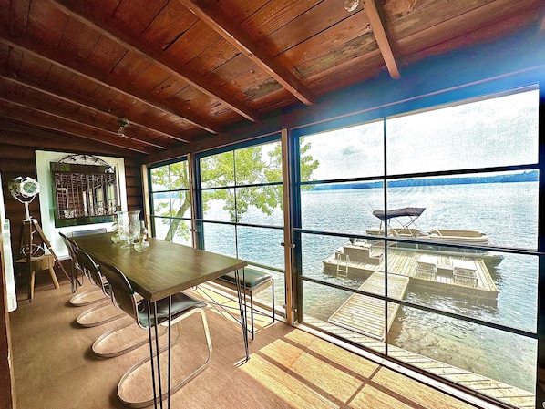 Main Cottage - view of lake from screened in porch dining