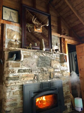 Stone fireplace with wood stove (wood provided)