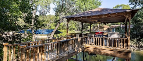 Party deck directly over the water with grill and refrigerator