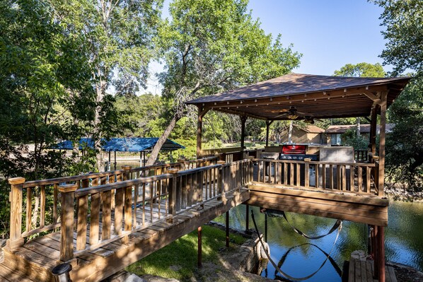 Party deck directly over the water with grill and refrigerator