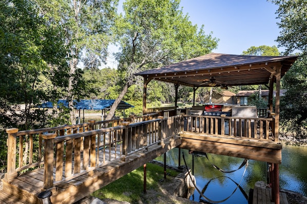 Party deck directly over the water with grill and refrigerator