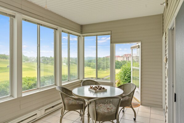 Sunroom with Walk-Out Access!