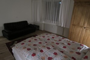 Bedroom 1, queen bed, sofa bed.