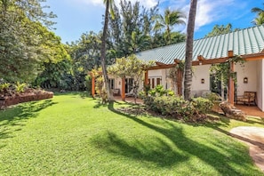 Wide view of trellised lanais adjoining two bedrooms