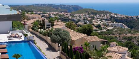 Sky, Water, Building, Property, Plant, Azure, Swimming Pool, Tree, Urban Design, Seaside Resort