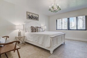 Master bedroom designed for relaxation featuring a spacious layout includes queen-sized bed, and elegant furnishings.