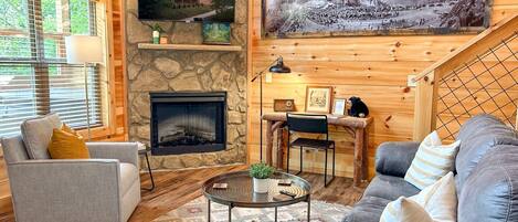 Light-filled living room with plenty of seating and a 50" Roku TV