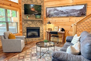 Light-filled living room with plenty of seating and a 50" Roku TV