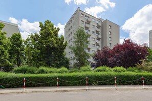 Greenery around the building. 