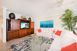 Stylish living area with HD television.