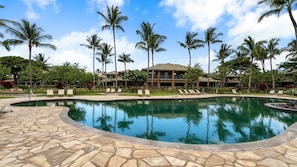 Tropical free-form 75,000 gallon pool with attached keiki (kiddie) pool and a beautiful spa with flowing waterfall.