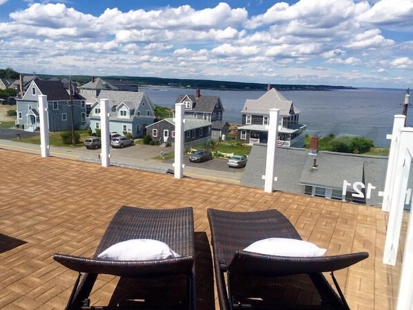 Unobstructed water view from this modern Roof Top Deck at 121 Broadway Avenue