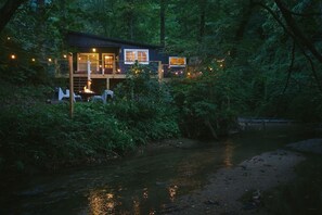 Enjoy a cozy fire next to the creek