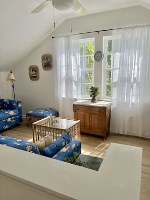 Bright Living room with a tranquil view of the Wilmington River