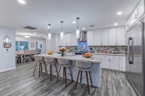 Kitchen is newly remodeled with generous work space and high end appliances.