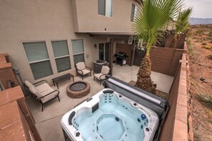Private Hot Tub and enclosed patio with fire pit, and grill
