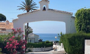 View to sea 🌊from beautiful traditional archway into complex