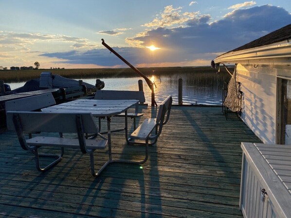 Wood seawall with poles to fit up to a 30’ boat