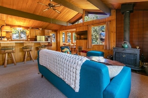 Living Room view from entry, open floor plan, ceiling fans throughout the house.