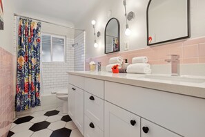 She's Pretty in Pink - Gorgeous remodeled retro bathroom.