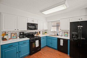 Bright kitchen with all the amenities of home