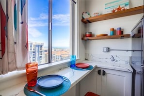 Recently remodeled kitchen with ocean views from the breakfast bar. 