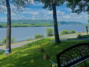 Enjoy the day sitting in the shade watching the boats go by