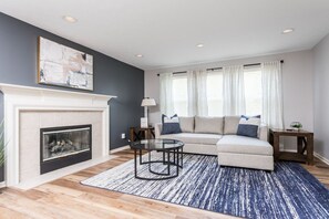 Large living room with gas fireplace