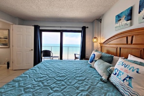 Watch the pelicans fly by outside of your master bedroom's balcony.