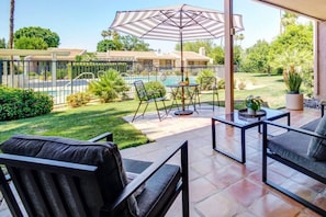 Cocktails & lounging with a pool view!