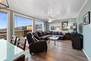 Ample seating in the living room in Surfview 1, ideal for family movie night.