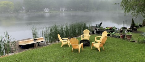 Lower tier back yard with lake at dawn.