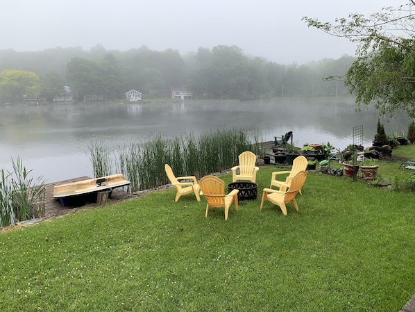 Lower tier back yard with lake at dawn.