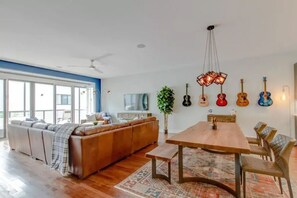 JOHNNY - Living room and dining room with huge Italian leather sectional